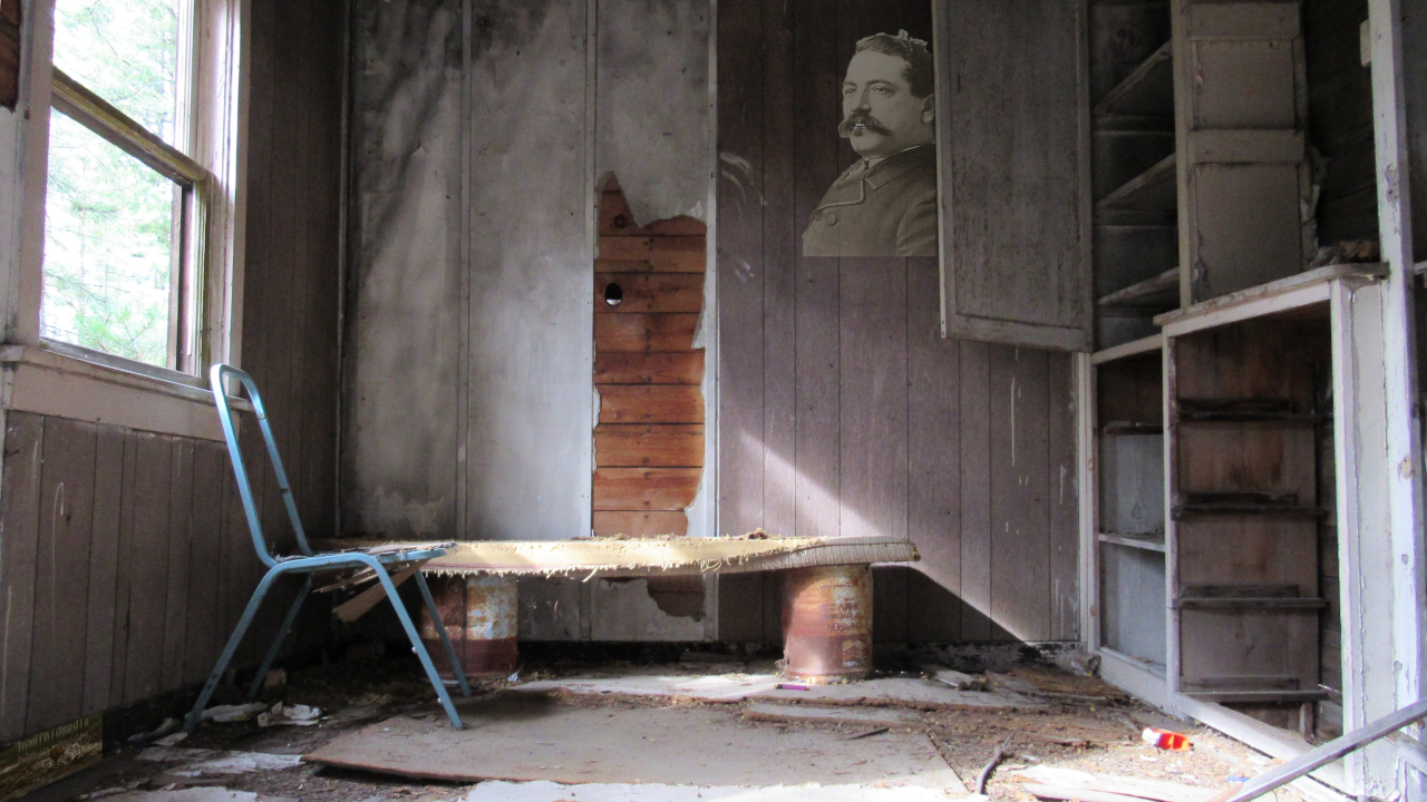 AFL leader Samuel Gompers photo hung on the wall of an abandoned (?) shack.